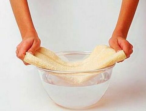 Fabric moistened in hot water